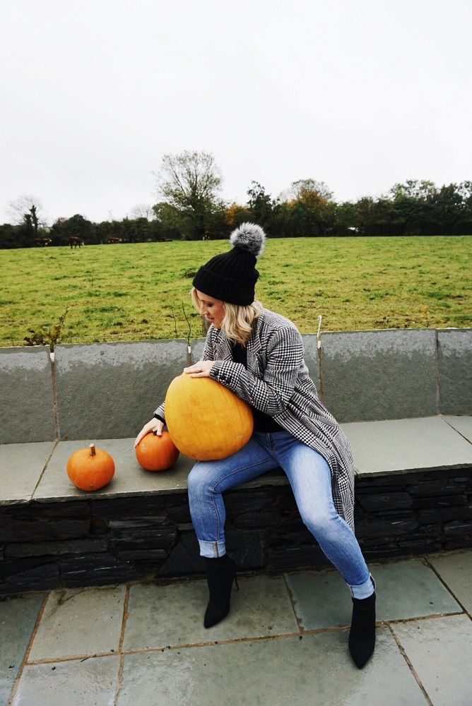 girl and pumpkins